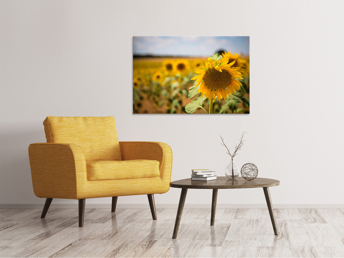 Leinwandbild Eine Sonnenblume im Feld