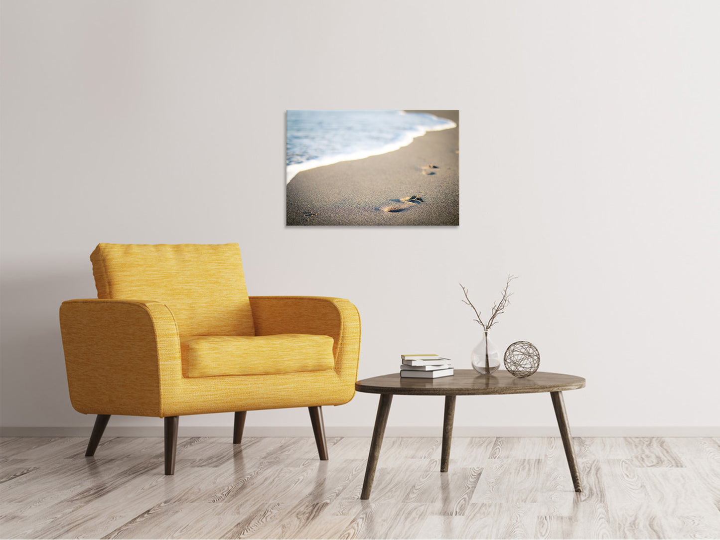 Leinwandbild Fussspuren im Sand am Strand