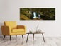 Leinwandbild Panorama Kleiner Wasserfall im Wald