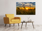 Leinwandbild Der Sonnenuntergang auf dem Feld