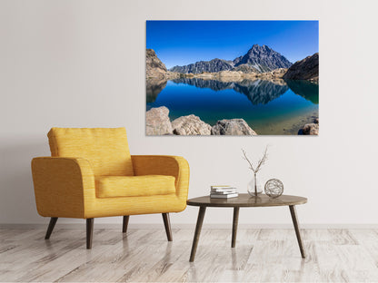 Leinwandbild Beruhigender Bergsee