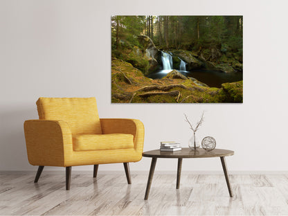 Leinwandbild Kleiner Wasserfall im Wald