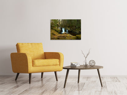 Leinwandbild Kleiner Wasserfall im Wald