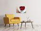 Leinwandbild Eine Tasse Himbeeren
