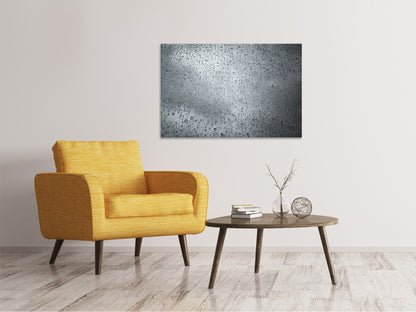 Leinwandbild Dunkle Regentropfen an der Wand