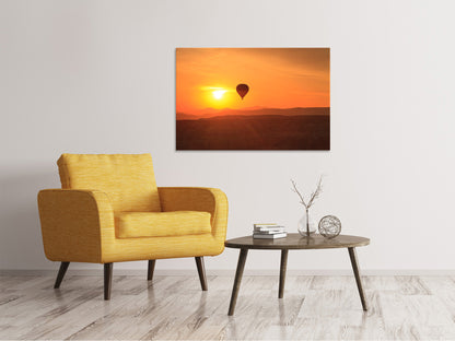 Leinwandbild Heissluftballon bei Sonnenuntergang